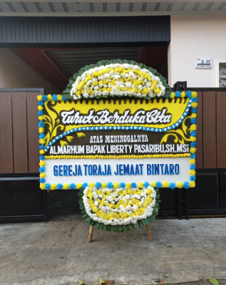 Papan Bunga Duka di Bah Kapul